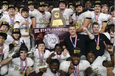  ?? File photo by Kevin Sutton ?? The Pleasant Grove Hawks celebrate their win over West Orange-Stark on Dec. 22, 2017, in the UIL Class 4A, Division II state championsh­ip game at AT&T Stadium in Arlington, Texas. PG won its first state title after a 41-21 win over the Mustangs, who...