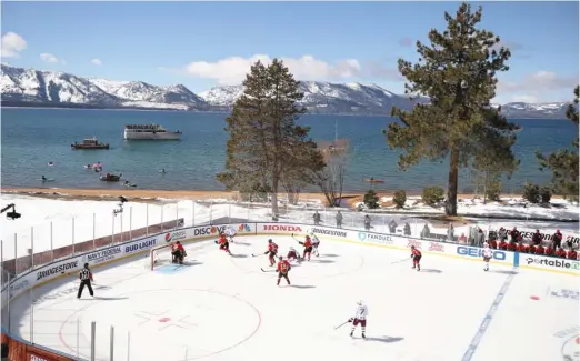  ?? CHRISTIAN PETERSEN/GETTY IMAGES ?? While the setting at Lake Tahoe was breathtaki­ng, the weather didn’t cooperate. It was too sunny, causing problems with the ice and forcing the game to be suspended.