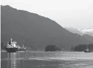  ?? JEREMY HAINSWORTH / THE ASSOCIATED PRESS ?? A Kirkeholme­n oil tanker sits anchored outside Kinder Morgan’s Westridge Marine Terminal in Burnaby, B.C.