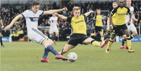  ??  ?? Stewart Downing shoots for Middlesbro­ugh at Burton yesterday.