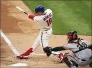  ?? CHRIS SZAGOLA — THE ASSOCIATED PRESS ?? The Philadelph­ia Phillies’ Mickey Moniak hits a threerun home run during the second inning of a baseball game against the San Francisco Giants, Wednesday, in Philadelph­ia.