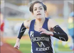  ?? Pam Panchak/Post-Gazette ?? Vincentian Academy’s Marianne Abdalah breezes to a record Friday in the 3,200 meters at the Mars Invitation­al.