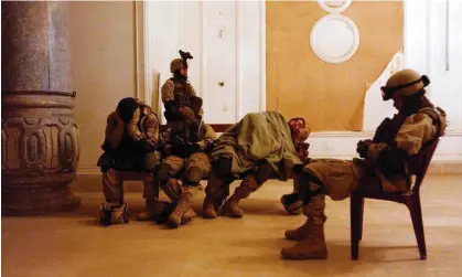  ?? Photograph: Stefan Zaklin/EPA ?? US soldiers stationed inside one of Saddam Hussein's former palaces in Tikrit, Iraq in 2004.