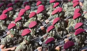  ?? File pic ?? Armed forces contingent from the 10 Paratroope­r Brigade during the 59th National Day parade in Kuala Lumpur recently.