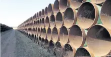  ?? CANADIAN PRESS FILES ?? A yard in Gascoyne, N.D., which has hundreds of kilometres of pipes stacked inside it that are supposed to go into the Keystone XL pipeline, is shown in 2015. A new report suggests that Keystone will be exempt from U.S. President Donald Trump’s order that it be built with U.S. steel.