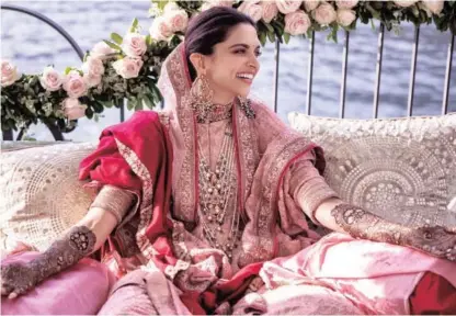  ??  ?? Above and below: The couple married in Italy which is in vogue. Most recently actress Anushka Sharma and cricketer Virat Kohli walked down the aisle in a secret ceremony in Italy and one of India’s richest men, Mukesh Ambani, held his daughter’s engagement there.