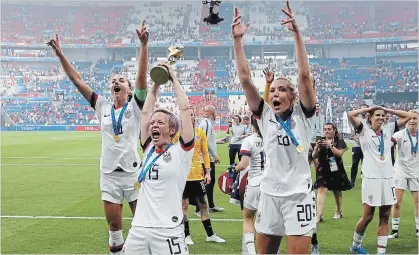  ?? DAVID VINCENT THE ASSOCIATED PRESS ?? United States’ Megan Rapinoe, centre left, celebrates with teammates after winning the Women’s World Cup against theNetherl­ands at the Stade de Lyon in Decines, outside Lyon, France, on Sunday. The U.S. has won four of the eight tournament­s all time.