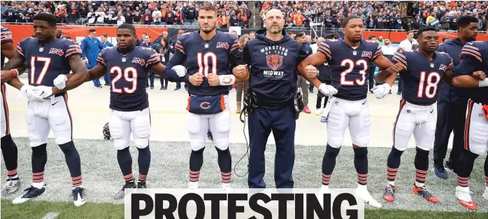 ?? CHARLES REX ARBOGAST/AP ?? Coach Matt Nagy links arms with players before the game against the Saints on Oct. 20, 2019.