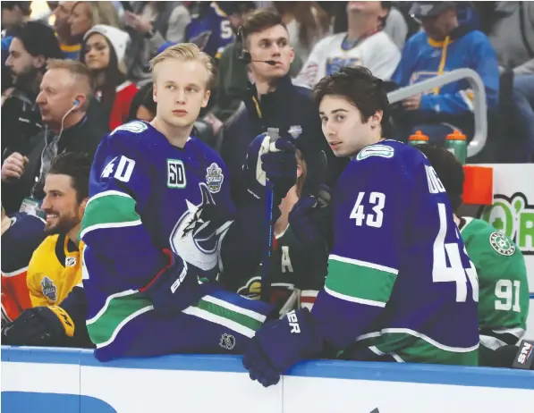  ?? BRUCE BENNETT/GETTY IMAGES FILES ?? Canucks youngsters Elias Pettersson, left, and Quinn Hughes, shown at the NHL All-Star Weekend in St. Louis in January, have made quite an impression on the National Hockey League, and that will cost the club.