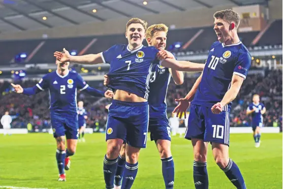  ??  ?? Role model Scotland and Celtic’s James Forrest is a player at the top of his game – but it wasn’t so long ago that he was being overlooked by Alex McLeish