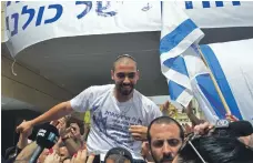  ?? AFP ?? Elor Azaria was greeted as a hero by friends and family on his release after serving nine months for killing a Palestinia­n