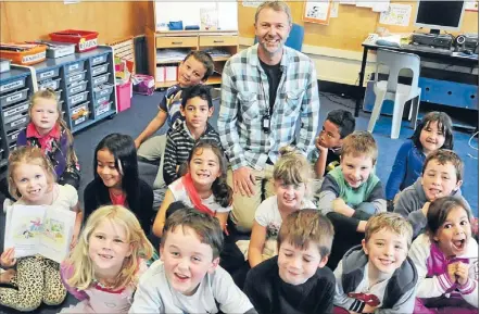  ??  ?? David Arrowsmith is the only male teacher in the junior school at Dyer St School. It is a job he loves after previously working looking after infrastruc­ture for the regional council.
