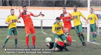  ??  ?? Penrhyndeu­draeth (yellow) in action against Conwy Borough last season