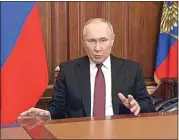  ?? RUSSIAN PRESIDENTI­AL PRESS SERVICE VIA AP ?? In this image made from video released by the Russian Presidenti­al Press Service, Russian President Vladimir Putin addressees the nation in Moscow, Russia, Thursday.