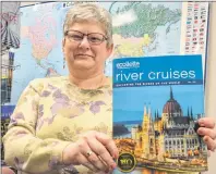  ?? CAPE BRETON POST PHOTO ?? Beryl Clements, senior travel consultant at Carlson Wagonlit Travel on Prince Street in Sydney, says cruises along European rivers like the Danube, Rhine and Seine are the latest travel trend.