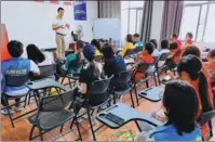  ?? PHOTOS PROVIDED TO CHINA DAILY ?? Left: Zhou Quan, the founder of Xin Deng Theater, narrates a movie for a blind and visually impaired audience at a cinema in Kunming, Yunnan province, in 2019. Center: Volunteers take a training course in Kunming. Right: A blind audience member gives his view of a movie narration.