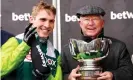  ?? Photograph: David Davies/PA ?? Harry Cobden and Sir Alex Ferguson celebrate with the Betway Bowl trophy.