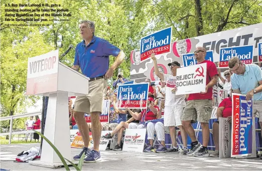  ?? JUSTIN L. FOWLER/ THE STATE JOURNAL-REGISTER VIA AP ?? U.S. Rep. Darin LaHood, R-Ill., gets a standing ovation as he takes the podium during Republican Day at the Illinois State Fair in Springfiel­d last year.