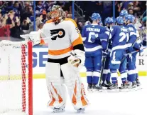  ?? THE ASSOCIATED PRESS/FILES ?? Michal Neuvirth, who has been injured for much of the season, is one of seven goalies the Philadelph­ia Flyers have employed between the pipes in just 43 games so far this NHL campaign.