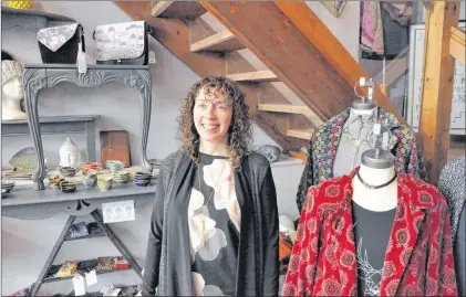 ?? KENN OLIVER/THE TELEGRAM ?? Posie Row owner Anita Carroll purchased the Tobin Building earlier this year and in addition to expanding her own store, she has turned the top three floors of the 123-year-old building into a retail co-op where small businesses and new entreprene­urs...