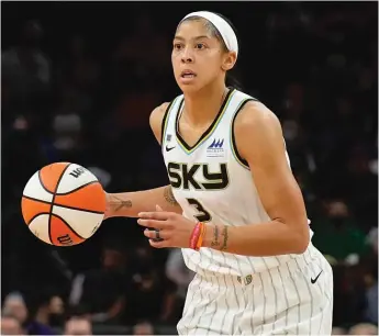  ?? AP FILE ?? Chicago Sky center Candace Parker moves the ball during Game 2 of the WNBA Finals against the Phoenix Mercury in Phoenix on Oct. 13. The Sky won the WNBA championsh­ip.