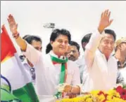  ?? PTI ?? Newly appointed Madhya Pradesh Congress state chief Kamal Nath (right) and chairman of election campaign committee Jyotiradit­ya Scindia during a roadshow in Bhopal on Tuesday.