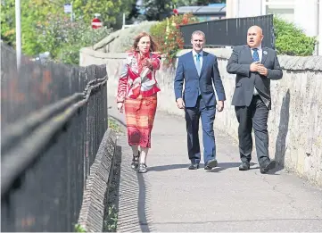  ??  ?? SITE VISIT: StARlink convener Jane Ann Liston, Transport Secretary Michael Matheson and StARlink secretary Dita Stanis-Traken on a part of the old railway line.