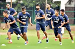  ??  ?? Chennaiyin FC players at a training session ahead of their match against FC Goa.