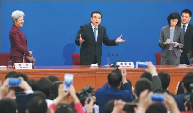  ?? XU JINGXING ?? Premier Li Keqiang speaks to reporters at the conclusion of a news conference after the closing session of the National People's Congress at the Great Hall of the People in Beijing on Wednesday.