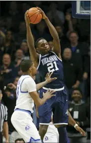  ?? THE ASSOCIATED PRESS FILE ?? Villanova’s Dhamir Cosby-Roundtree, right, in this shot from a Villanova win over Cincinnati in 2018, will not play the 2021-22season due to recurring leg issues.