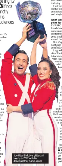  ??  ?? Joe lifted Strictly’s glitterbal­l trophy in 2017 with his dance partner Katya Jones