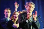  ?? JEFF SWENSEN/GETTY IMAGES ?? U.S. Sen. Sherrod Brown and supporters celebrate his victory Tuesday night at the Hyatt Regency in Columbus.