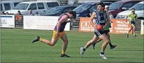  ?? ?? In the clear: Mackenzie Cowley runs in to an open goal to kick one of his six goals on Friday against Nathalia.