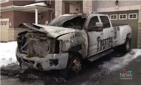  ??  ?? A burned-out tow truck in Toronto. Much of trouble stems from ‘accident chasing’ – where truck operators race their rivals to be the first at the scene of a crash. Photograph: CTV News Toronto
