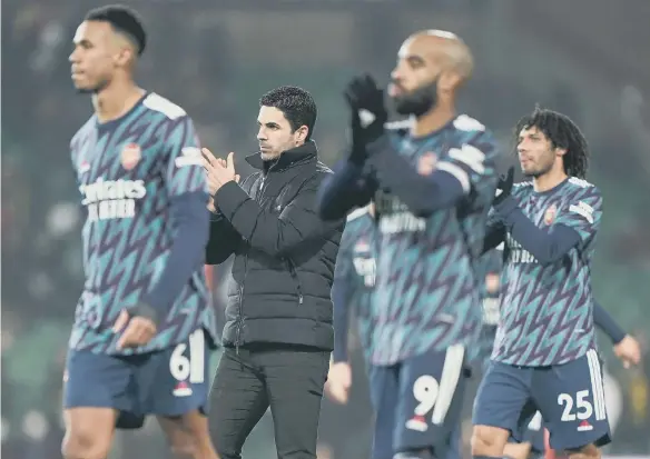  ?? ?? Arsenal manager Mikel Arteta (centre) applauds the fans after the final whistle of the Premier League match at Carrow Stadium.