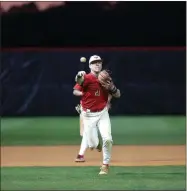  ?? Hassan niblet ii ?? Sonoravill­e senior infielder Zevyn Ferguson fires across his body and the diamond Monday night to record an out against East Forsyth in the GHSA 4A state baseball playoffs at The Furnace.