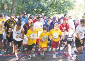  ?? Contribute­d photo ?? The Miles for a Mission Road Race returns to North Stamford on Sept. 23.