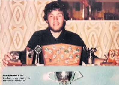  ??  ?? Local hero Joe with trophies he won during his time at East Killbride YC