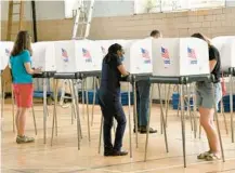  ?? AMY DAVIS/BALTIMORE SUN ?? Voter turnout was light on the first day of voting at the Public Safety Training Center, one of Baltimore’s early voting sites. City Election Director Armstead Jones reported that voting was slow at all the voting centers Thursday morning.