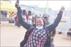  ?? ?? This woman couldn’t hold her excitement as she won her share of the prizes (E100 airtime) by spinning the wheel.