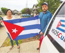  ?? GAVIN YOUNG ?? Cuban-canadians Anne Marie Harmsen and her husband Jose Gonzalez are part of local protests calling for democracy in Cuba.