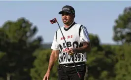  ?? GEORGE WALKER IV / ASSOCIATED PRESS ?? Exactly what the Malbon brand is looks quite different from the traditiona­l country club vibe. It is more like vintage streetwear, and one of the vehicles to bring it to the masses has been Jason Day.