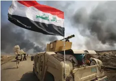  ??  ?? AHMAD AL-RUBAYE | AFP Tropas iraquianas apoiadas por milícias fazem progressos