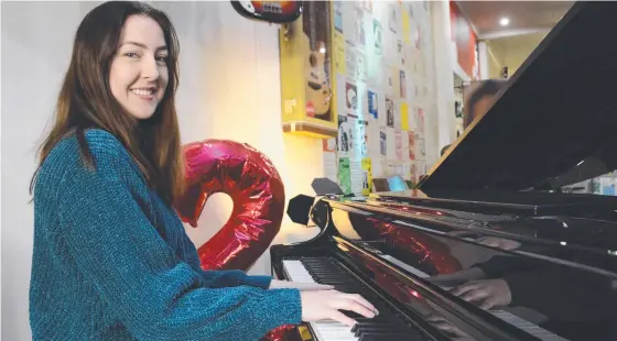  ??  ?? VOCAL SUPPORT: Toowoomba musician Meg Beth, performing at Cafe Guitar on Russell Street, is excited to be part of the new Live and Local program, backed by the Toowoomba Regional Council. Picture: Tom Gillespie.