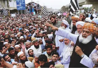  ?? AFP ?? Maulana Fazalur Rehman, head of Pakistan’s hardline party Jamiat Ulema Islam, addresses supporters in Peshawar condemning the acquittal of Asia Bibi.