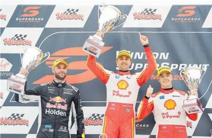  ?? Photo / Getty Images ?? Fabian Coulthard (centre) celebrates with Shane van Gisbergen (left) and Scott McLaughlin.