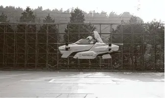  ?? SkyDrive / Cartivator 2020 / Associated Press ?? The test flight of a piloted “flying car” takes place at Toyota Test Field in central Japan. The machine, made by Japan’s SkyDrive Inc., so far can fly for just five to 10 minutes.