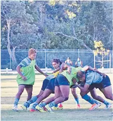  ?? Picture: FRU ?? Right: The Fijiana 7s team forwards test their scrum during a training session in Brisbane last week.