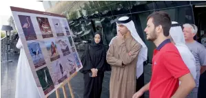  ??  ?? Dr Thani Ahmed Al Zeyoudi being briefed about the various activities at the reserve.