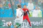  ?? [AP PHOTO] ?? France’s Antoine Griezmann scores his side’s second goal during the quarterfin­al match between Uruguay and France, Friday at the 2018 soccer World Cup in the Nizhny Novgorod Stadium, in Nizhny Novgorod, Russia.
